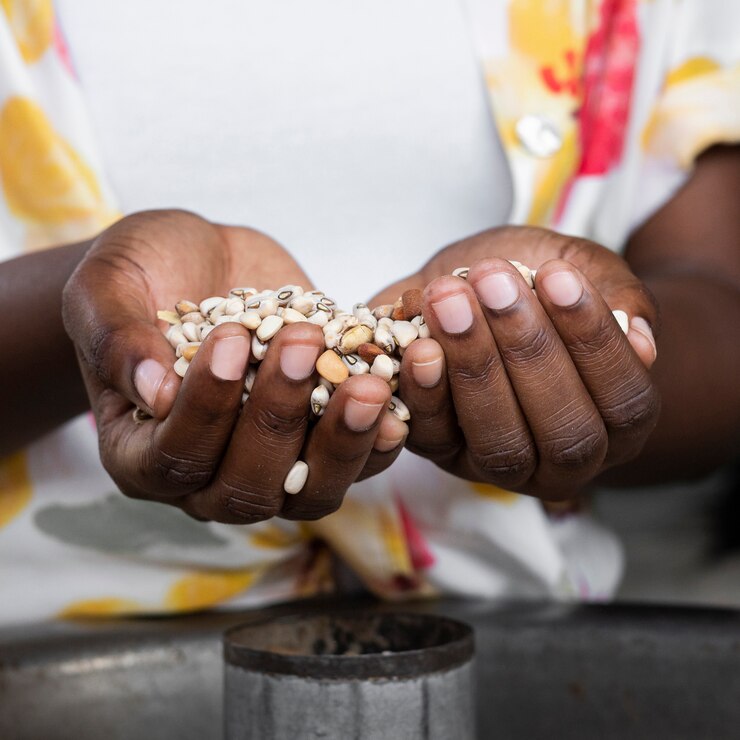 close-up-hands-holding-beans_23-2148789682.jpg